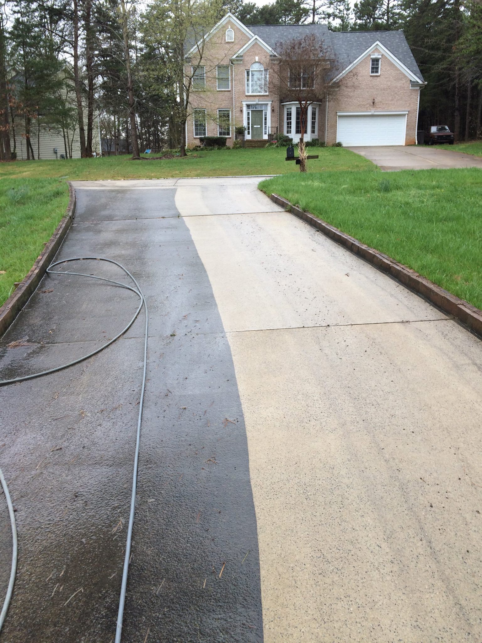 Before and after pressure washing driveway