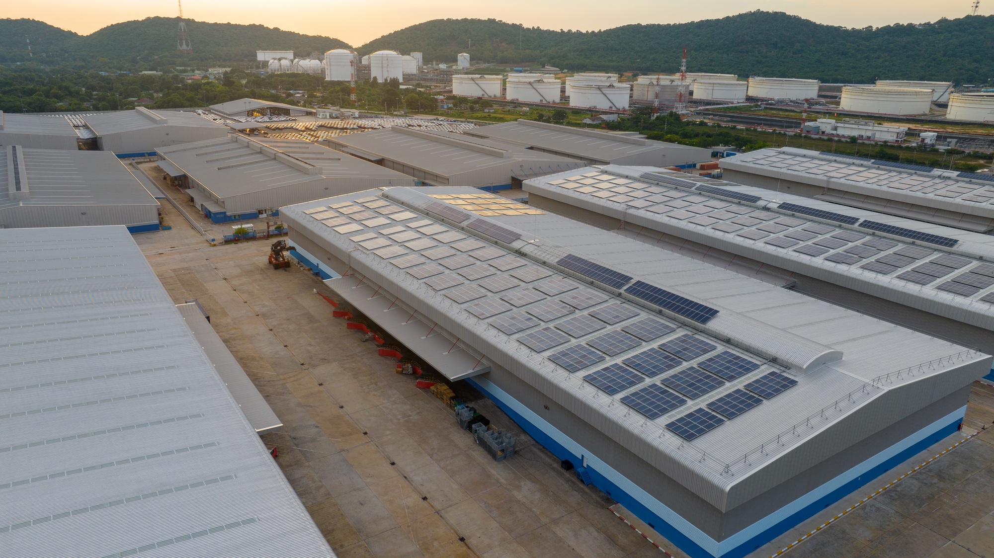Top view Solar Panels on Warehouse Factory. Solar photo voltaic panels system power or Solar