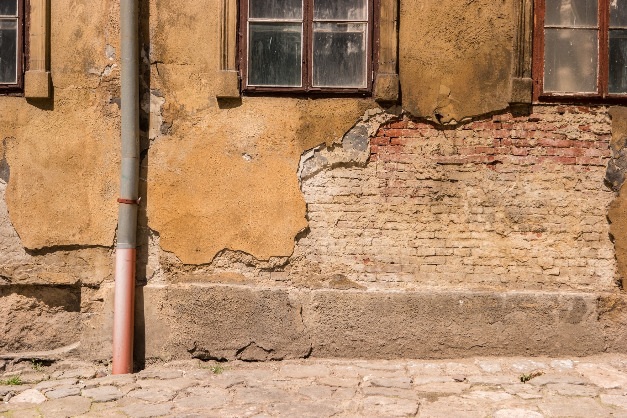 Wall of a damaged building.